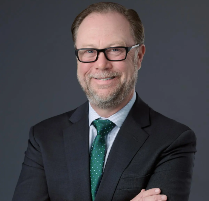 A headshot of Bryan Dickson